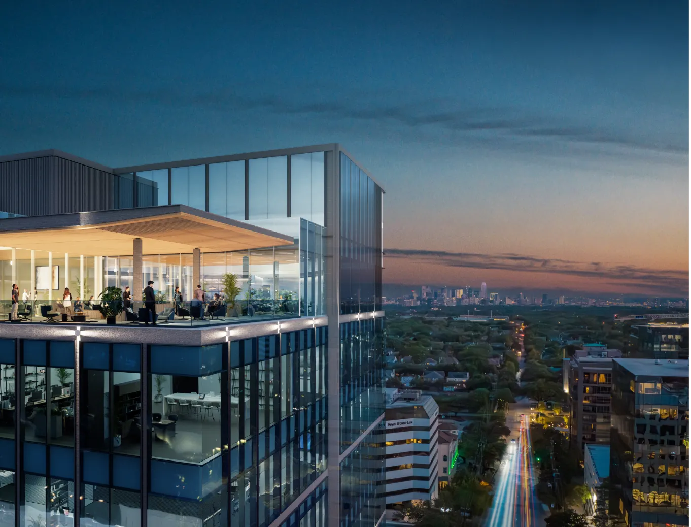 Rooftop glass lounge on skyscraper overlooking vibrant city skyline during colorful evening sunset